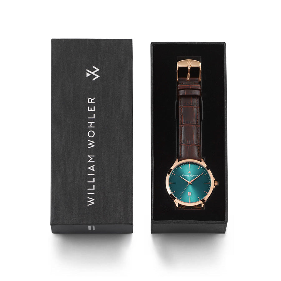 Montre homme Ambre Turquoise William Wohler — boîtier or rose 41 mm, bracelet cuir alligator marron, cadran turquoise