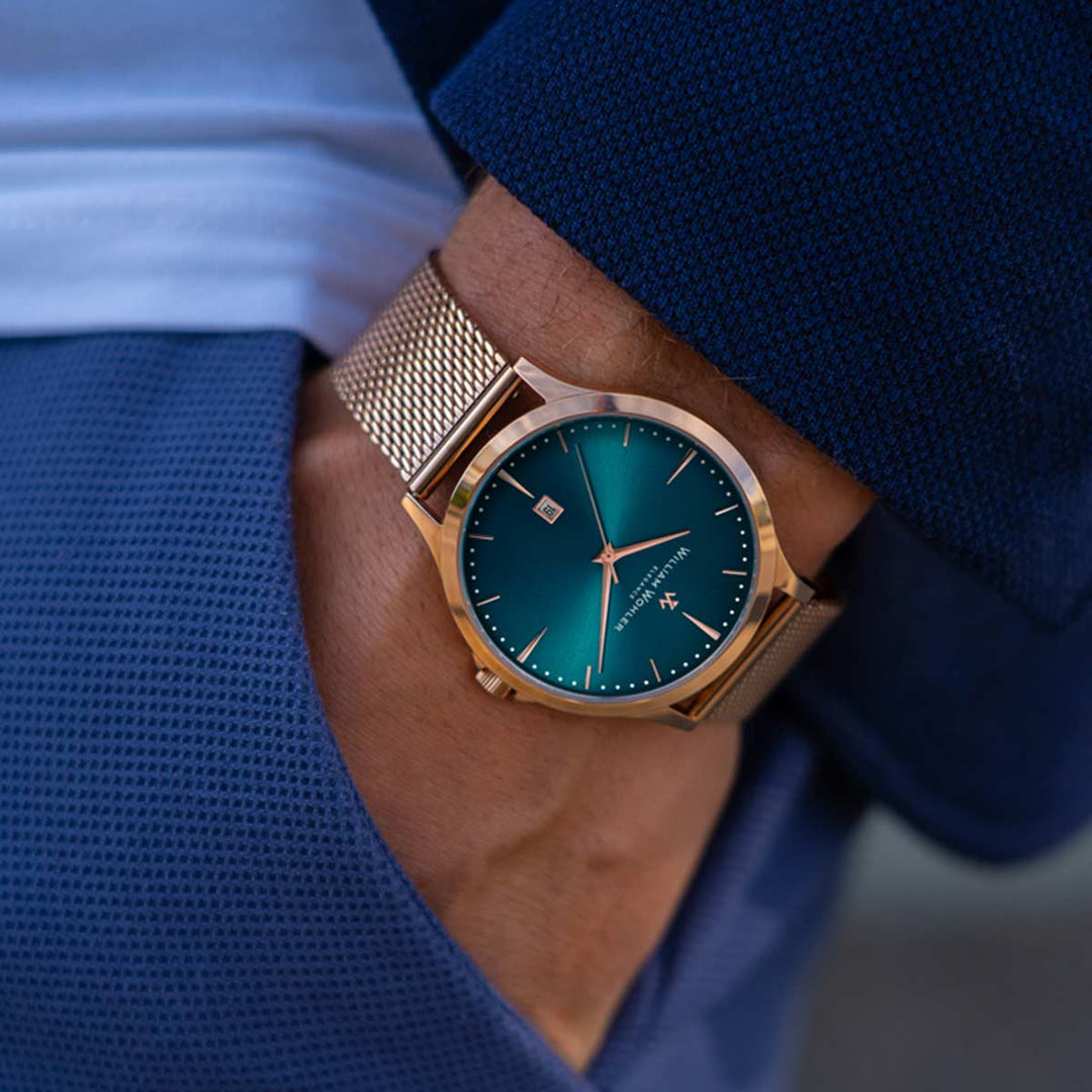 Montre homme Émeraude Dorée William Wohler — boîtier et bracelet maille milanaise or rose 41 mm, cadran bleu océan